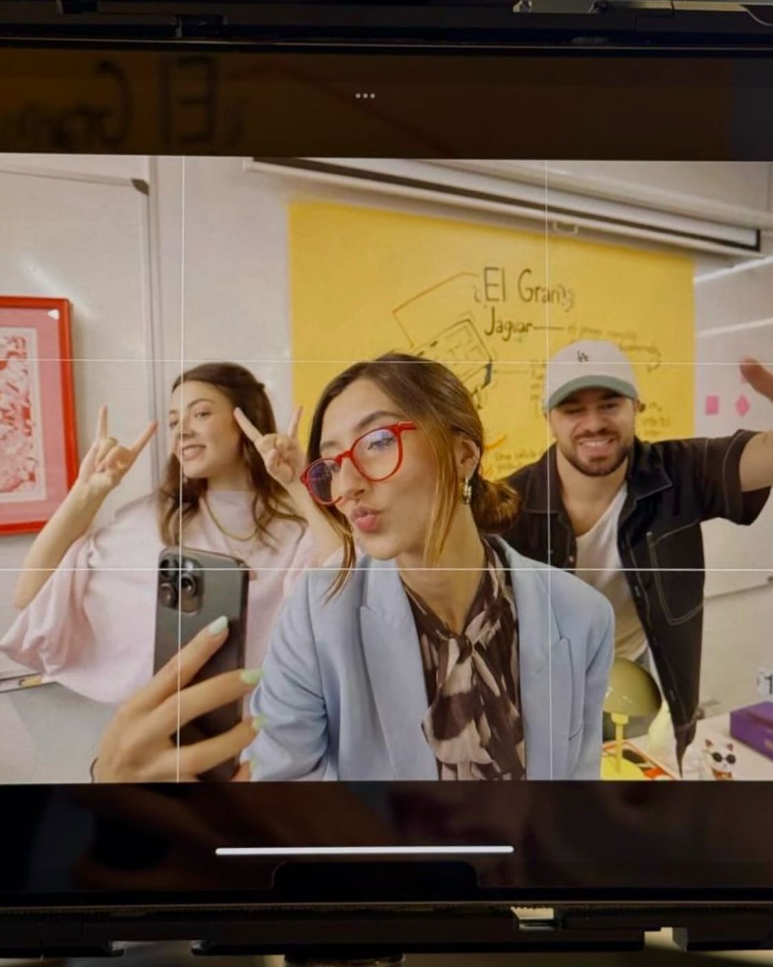 Behind-the-scenes shot on the camera monitor in the classroom.